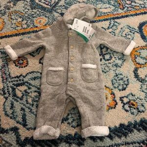 H & M romper with adorable pom pom hood.